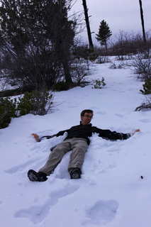 227 8gu. Zion National Park - Cable Mountain hike - Brian making a snow angel