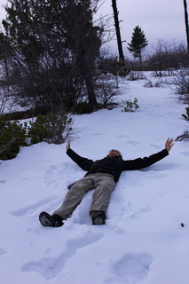 229 8gu. Zion National Park - Cable Mountain hike - Brian making a snow angel