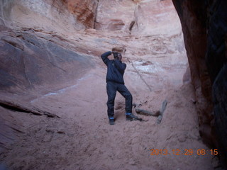 26 8gv. Cave Valley hike - our echo cave - Shaun taking a picture
