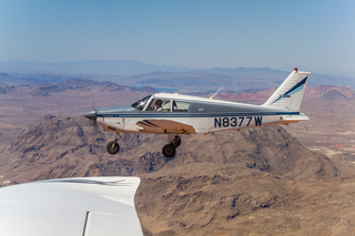 N8377W in flight over Valley of Fire