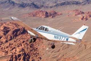 1327 8hn. N8377W in flight over Valley of Fire