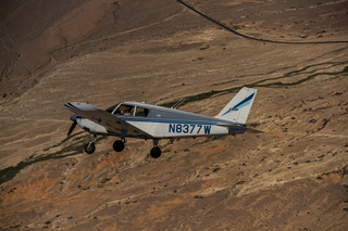 1332 8hn. N8377W in flight over Valley of Fire