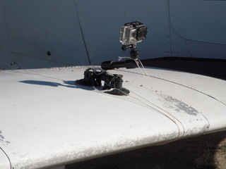 1355 8hr. GoPro video camera mounted on wing N8377W