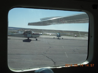 133 8me. view from N51SA of airplane taxiing (is that some fellow's leg?)
