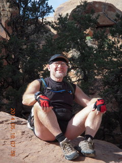 56 8mg. Arches National Park - Devil's Garden hike - Adam in Double O Arch
