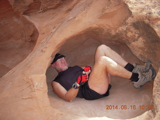 114 8mg. Arches National Park - Devil's Garden hike - Adam in hole in the rock