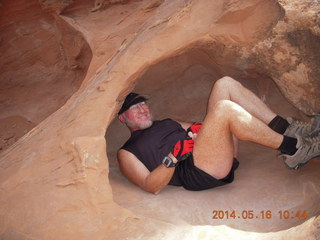 Arches National Park - Devil's Garden hike - Adam in hole in the rock