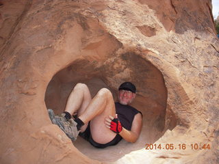 Arches National Park - Devil's Garden hike - Adam in hole in the rock