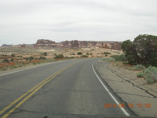 Arches National Park drive - lots of cars parked