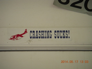 Mack Mesa airport - Crashing Sucks! sign