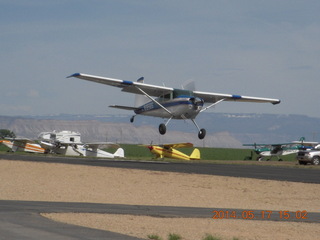 163 8mh. Mack Mesa airport - landing airplane