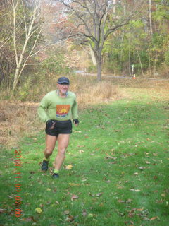 2516 8t9. Curtis Arboretum - fall foliage - Adam running