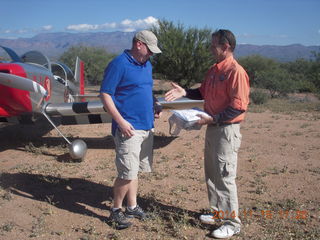 raffle winner with Mark Spencer and Mark's airplane