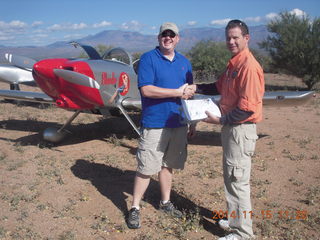 raffle winner with Mark Spencer and Mark's airplane