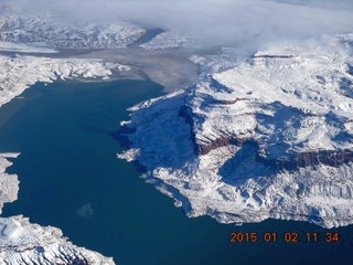 22 8v2. aerial - snow and part of Lake Powell