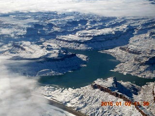 24 8v2. aerial - clouds and snow and Lake Powell