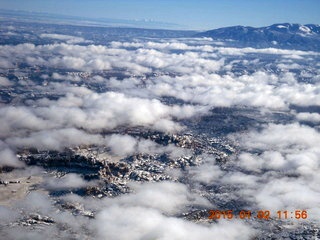 aerial - snow and clouds and canyon