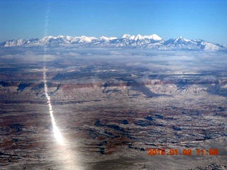 41 8v2. aerial - snow and clouds and canyonlands