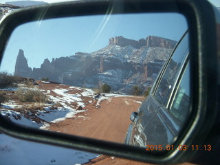 driving from Fisher Towers hike - rear side view mirror