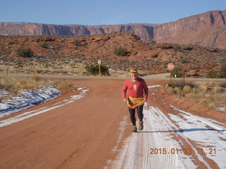 81 8v3. driving from Fisher Towers hike - Adam running - tripod and timer