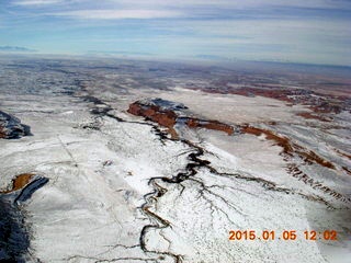 79 8v5. aerial - snowy canyonlands
