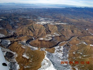 86 8v5. aerial - snowy canyonlands