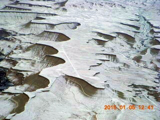 115 8v5. aerial - snowy canyonlands - Sand Wash airstrip