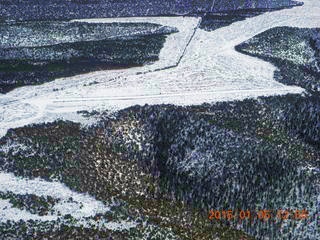 126 8v5. aerial - snowy canyonlands - Book Cliffs - Moon Ridge airstrip