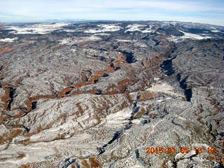 149 8v5. aerial - snowy canyonlands - Colorado hills