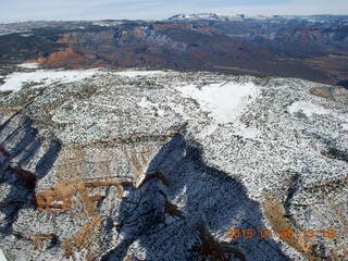 151 8v5. aerial - snowy canyonlands - Colorado hills