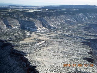 153 8v5. aerial - snowy canyonlands - Colorado hills