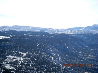 160 8v5. aerial - snowy canyonlands - Colorado hills