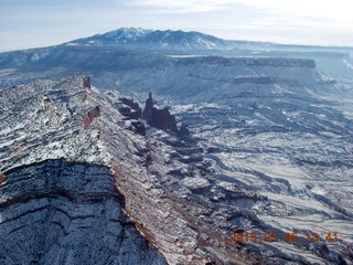 185 8v5. aerial - snowy canyonlands - Fisher Towers