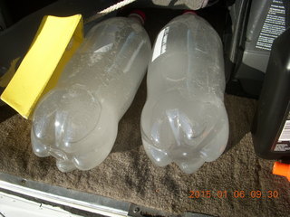 75 8v6. frozen water-filled pop bottles