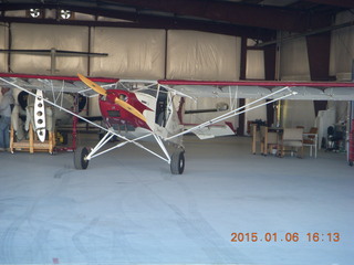 tailwheel airplane in hangar