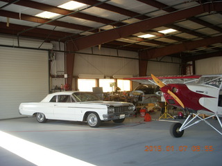 3 8v7. Chevy Impala and airplane in SGU hangar