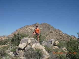 2640 8yb. Bagdad run/hike - Adam on a rock