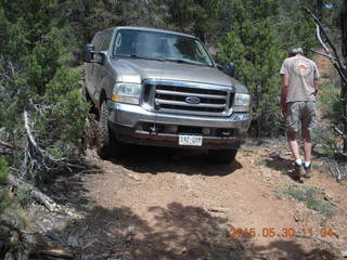 129 8zw. drive to Calamity Mine - very tough side road - Shaun outside the truck