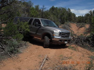 138 8zw. drive to Calamity Mine - very tough side road - truck driving a tight curve