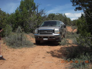 140 8zw. drive to Calamity Mine - very tough side road - truck driving a tight curve