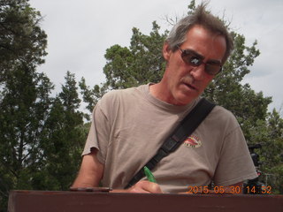 262 8zw. Calamity Mine camp site - Shaun signing in