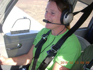 375 98d. Laura flying N8377W at Alamo Lake