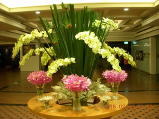 4 98s. Royal River Hotel - flowers in lobby