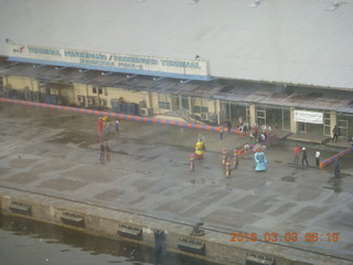 10 993. Indonesia - Jakarta port seen from ship - people to greet us