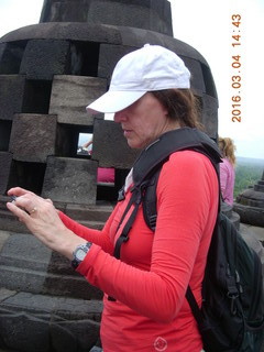 98 994. Indonesia - Borobudur temple - woman taking a picture