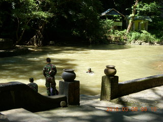 77 998. Indonesia - Bantimurung Water Park - soldiers in the river