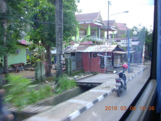 209 998. Indonesia - drive back - bridges to houses