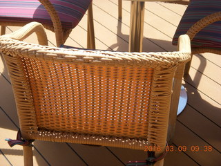 86 999. deck chair casting shadows