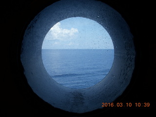 3 99a. Volendam at sea - porthole view