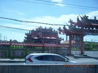 363 99d. Indonesia - Bali - bus ride - monument - temple